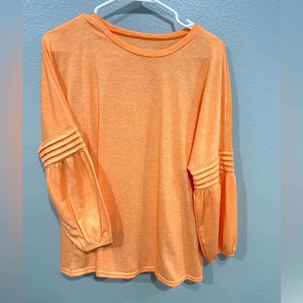 Bright orange top
